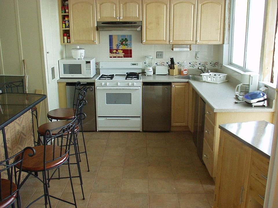 Note: stove relocated to inside kitchen