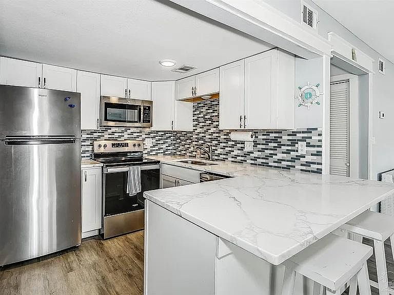 1st image of 308 Miracle Strip Pkwy SW Unit 1C