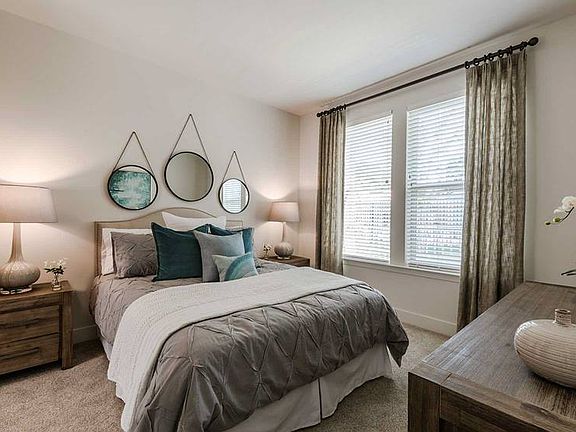 Bedroom with carpeted flooring