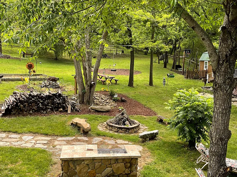 Barbecue, firepit and firewood storeage.
