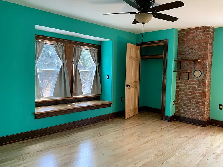 second floor front bedroom - custom built ins