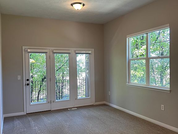 Dining / family room - northwest facing - a beautiful view with a lovely tree that shades the home