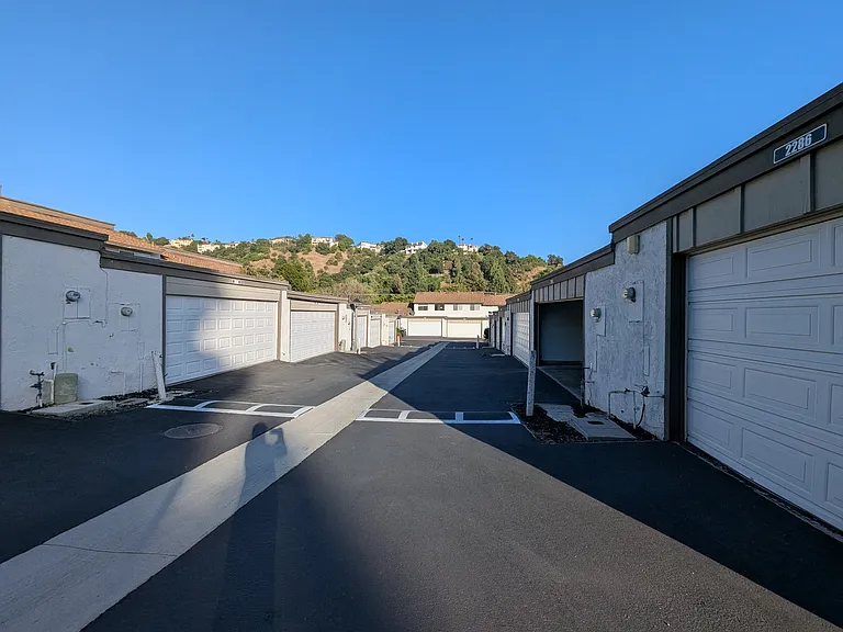 Private Road to Condo's 2-Car Garage; Own Water Faucet Outside of Garage