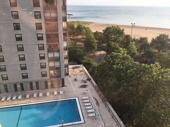 An outdoor pool between the towers.