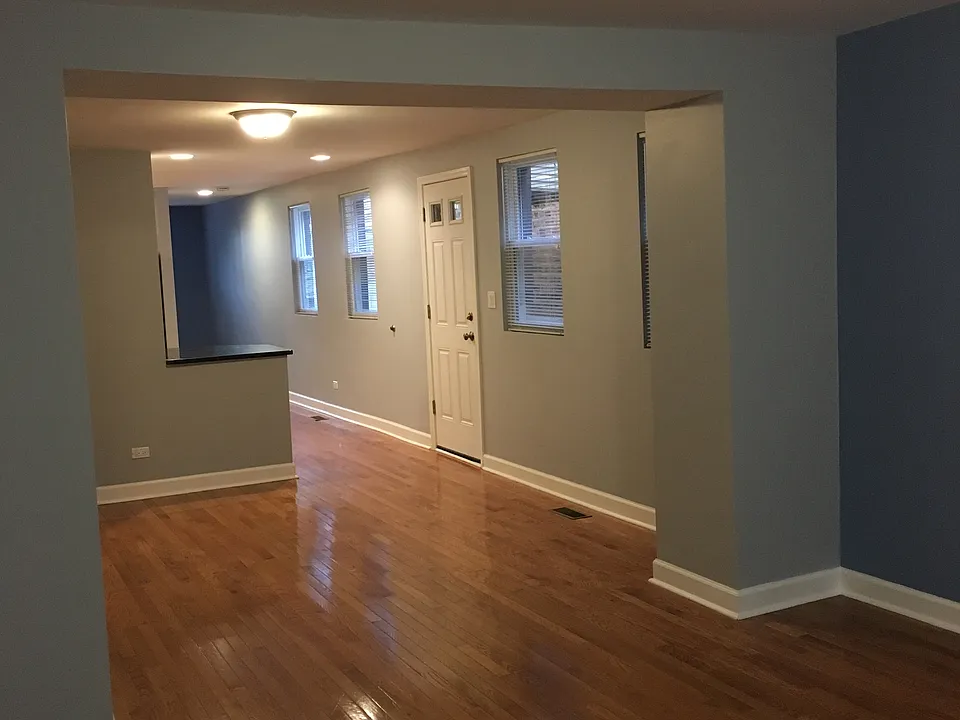 View from entry to living, dining, kitchen