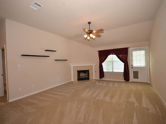 Wired for surround sound, this family room is perfect for en