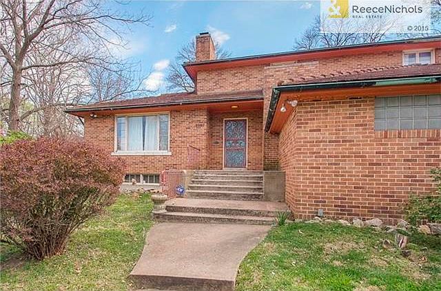 All brick home sits on top of great lot