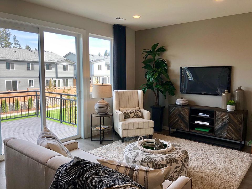 Living with access to deck with views for open light and air