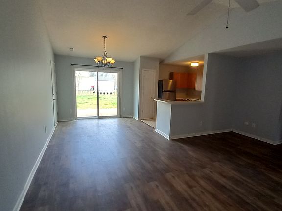view of dining area and kitchen from living room