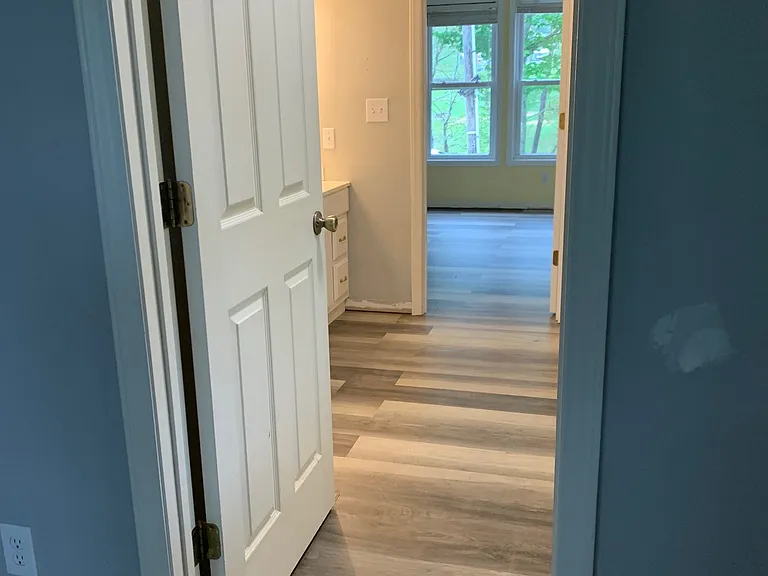 Master bedroom looking into the master bathroom