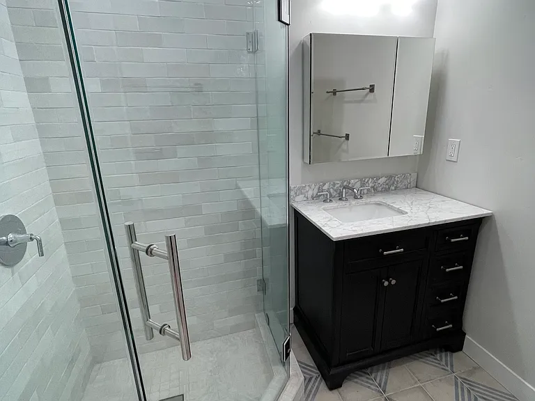 Bathroom vanity and shower.
