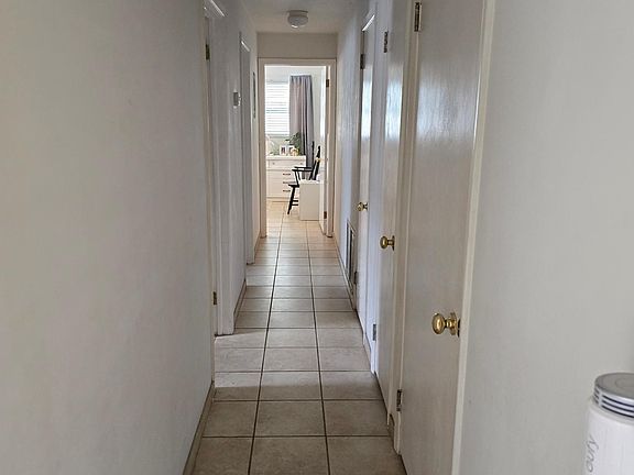 Hall leading from kitchen to bedrooms and bathrooms