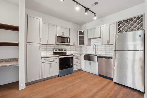 Modern kitchen with stainless steel appliances - Comet Scotts Hill