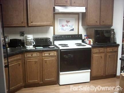 Kitchen
						:
						Beautiful view of wooden floors ( 15' x 14' )