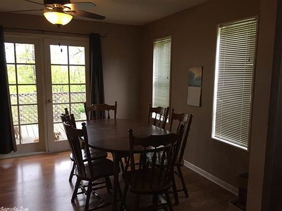 Dining is open to the sliding glass doors for  ease of all your family cookouts