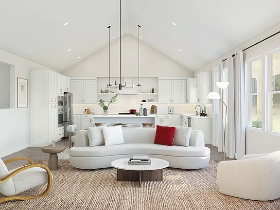 Great room with vaulted ceiling and LED low profile lighting