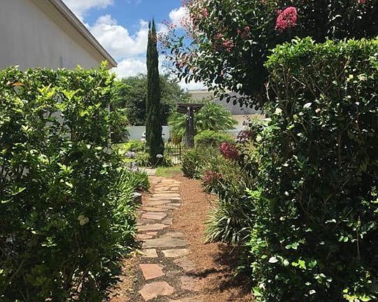 Garden path to backyard patio