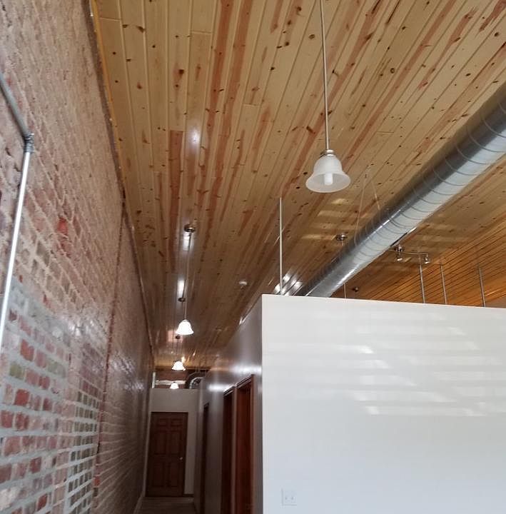 BEAUTIFUL CAR-SIDING CEILING AND PENDENT LIGHTING