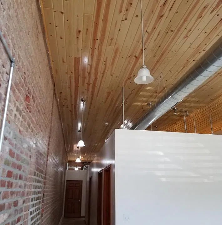 BEAUTIFUL CAR-SIDING CEILING AND PENDENT LIGHTING