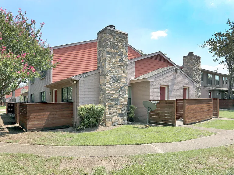 Charming exterior with well-maintained landscaping, large patios, and only 2-story buildings with inviting curb appeal.