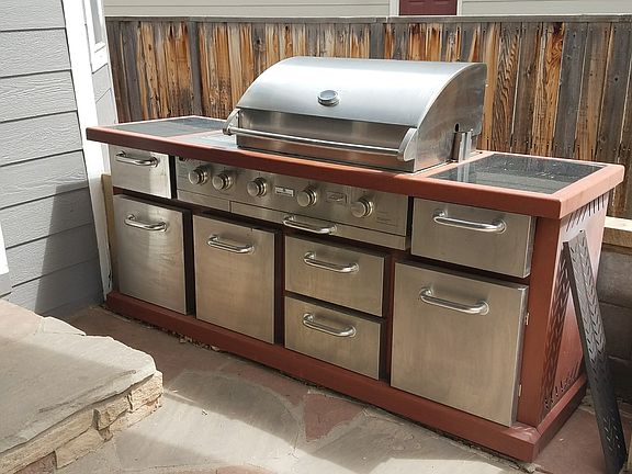 Outdoor BBQ under canopy