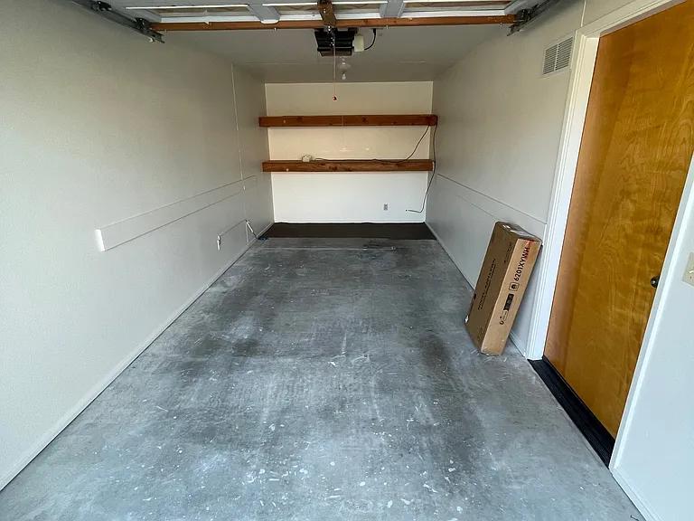 Single Car Garage with automatic garage door opener.