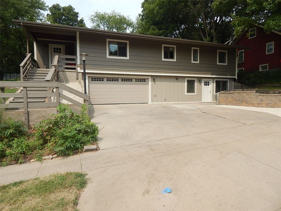 Complete renovation in 2021. 2 Car Heated garage. 3 BR Up and 1 Down, 2 BA, 5 Parking Total, 2 Kitchens up/dwn Full Laundry Onsite