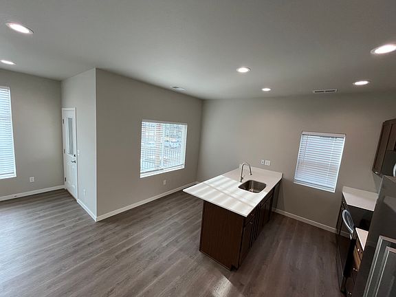 Ample counter space and room to move around in the kitchen.