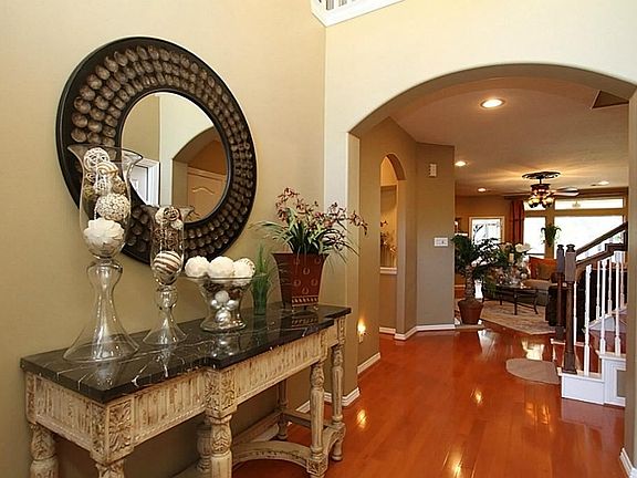 From the moment you enter, you know you are truly home. Updates and luxurious touches surround you.