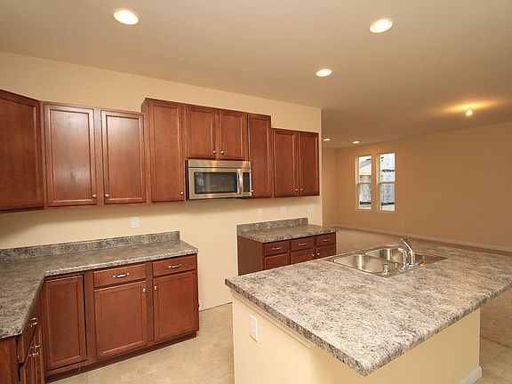 Kitchen with island and custom cabinets