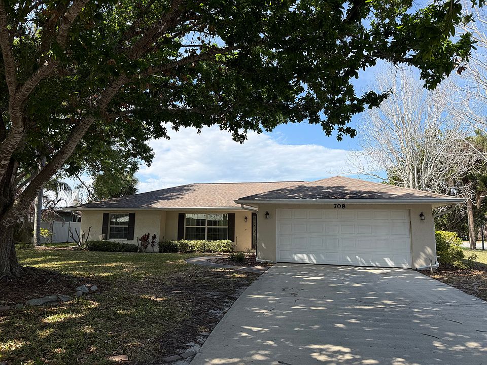Home is on a corner lot with fenced in yard and mature oak trees providing lots of shade