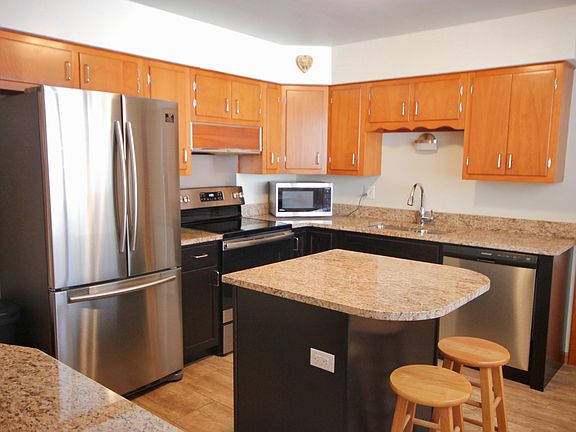 Kitchen with Granite Countertops and Stainless Steel Appliances