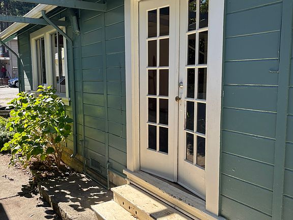 French doors. Side entry to kitchen