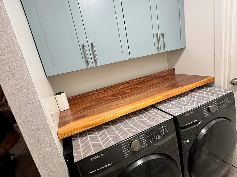 Full size washer dryer and storage cabinets INSIDE