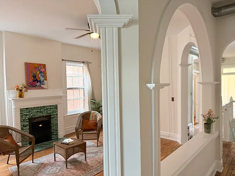 Elegant archways and millwork throughout.