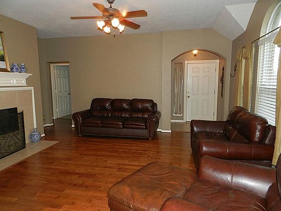 Beautiful Rich Hardwood Floors.  Vaulted ceilings and lighted ceiling fan.