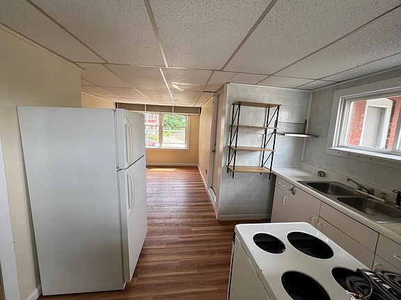 Top of stairs thru Kitchen towards bonus space or living