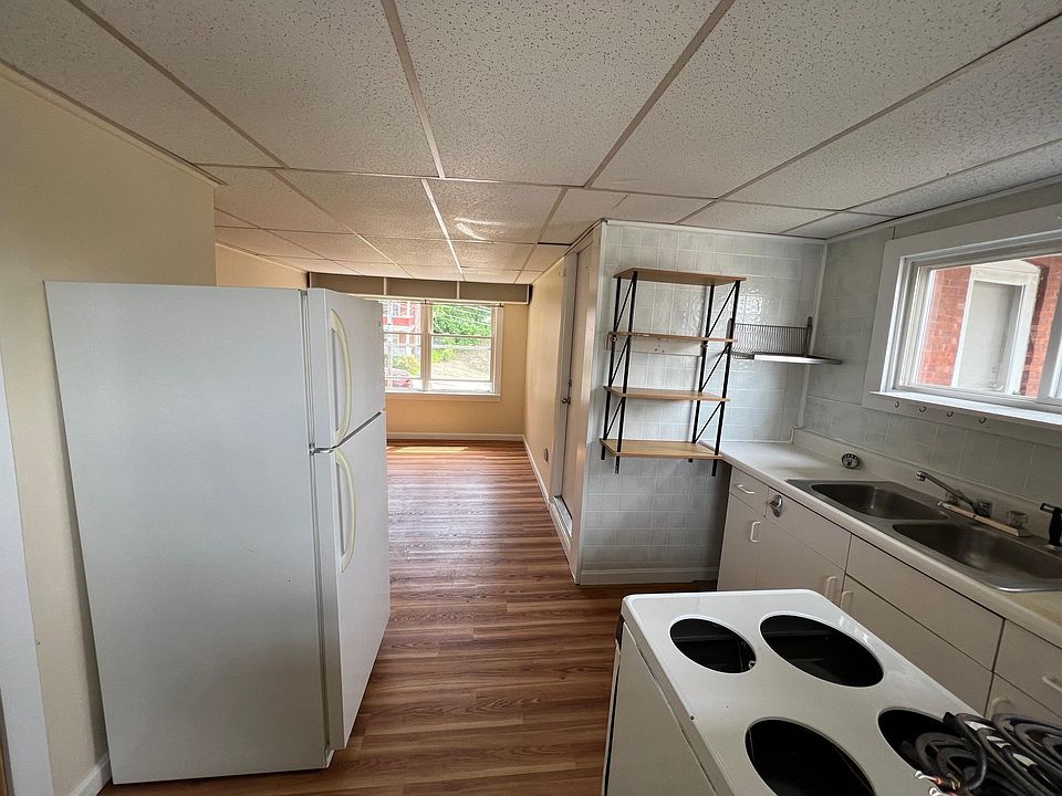 Top of stairs thru Kitchen towards bonus space or living