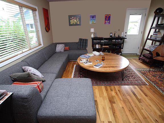 living room and backdoor to private side yard