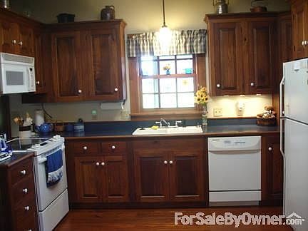 Custom Cabnets in all of house
						:
						13/16 inch SOLID hardwood in all rooms