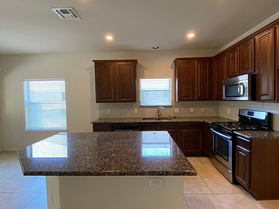 Kitchen with Gas Range and Chef island