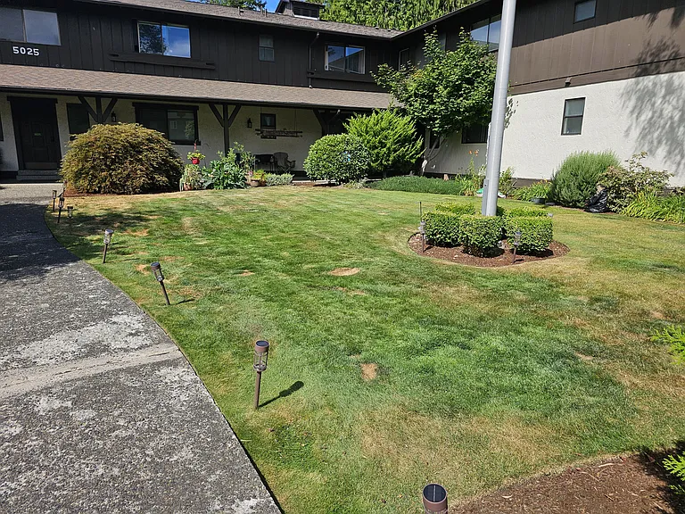 Well maintained landscaping leading to entrance