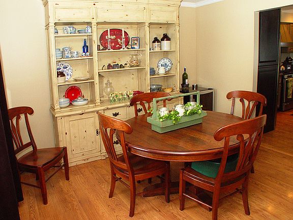 Dining room has laminated flooring
