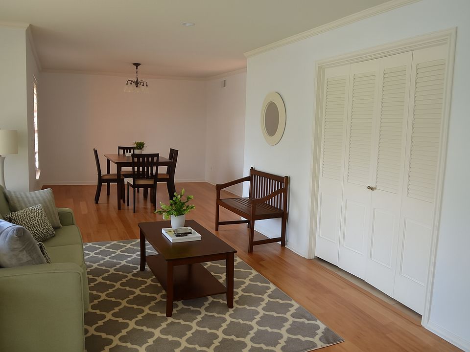 Formal living and dining area leading into second living area