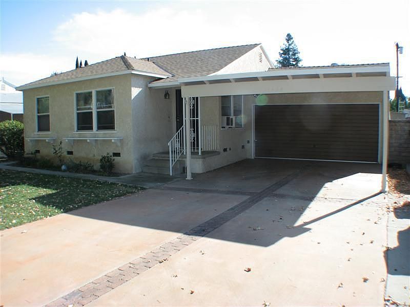 Front w/Garage PLUS Carport