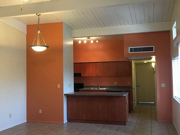 The kitchen is efficient and pretty.