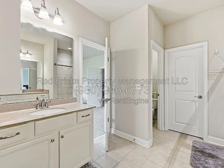 9659 Camberley Ave NW — Photo 31