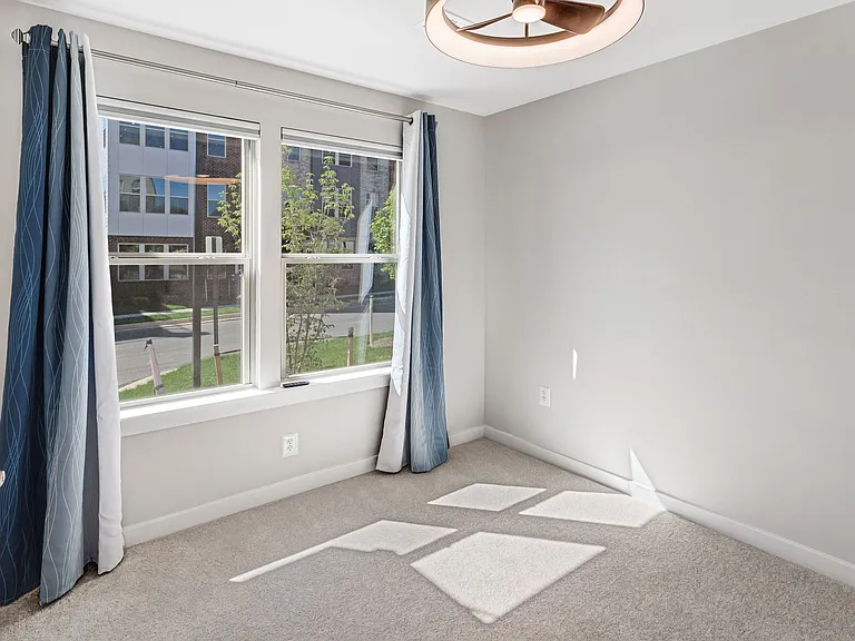 Versatile entry-level suite ideal for guests, remote work, or a private retreat with easy access and added separation from the main living areas.