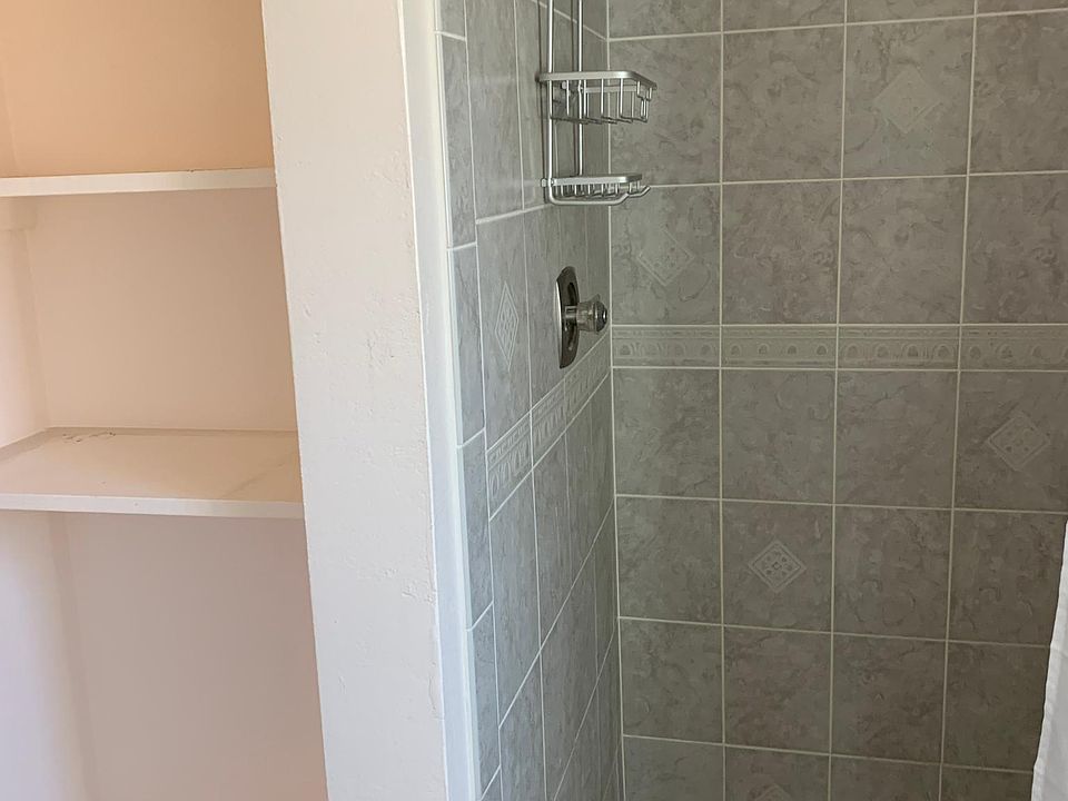 Master bathroom shower/linen shelves