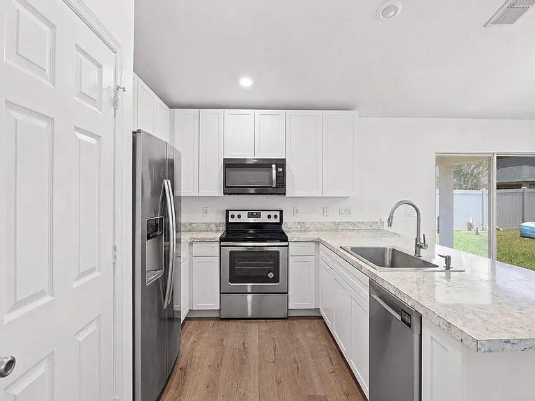 5870 NW Pine Trail Cir — Photo 16